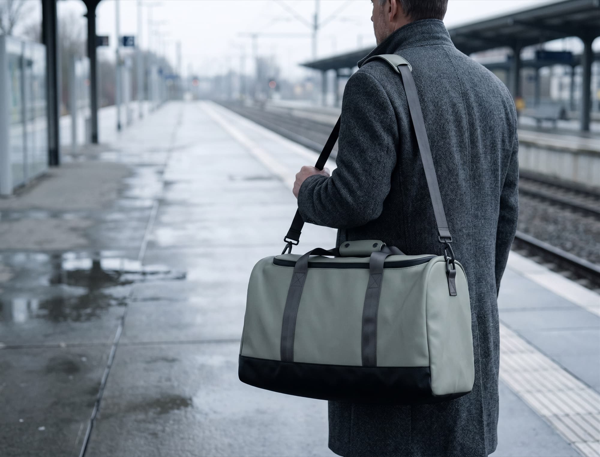 Shouldered on an empty train platform