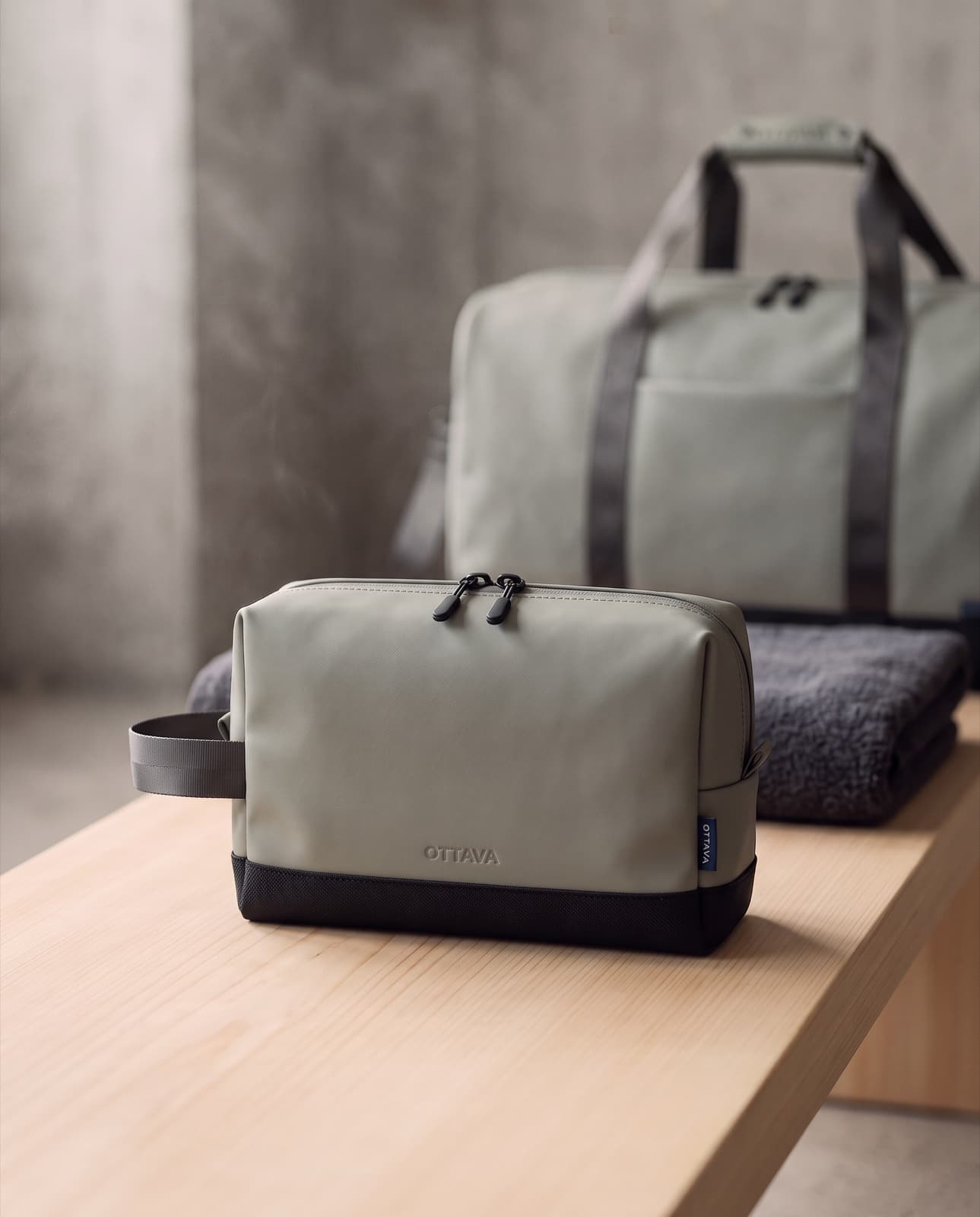 Grip Pouch on a spa bench with the Duffel 40 behind